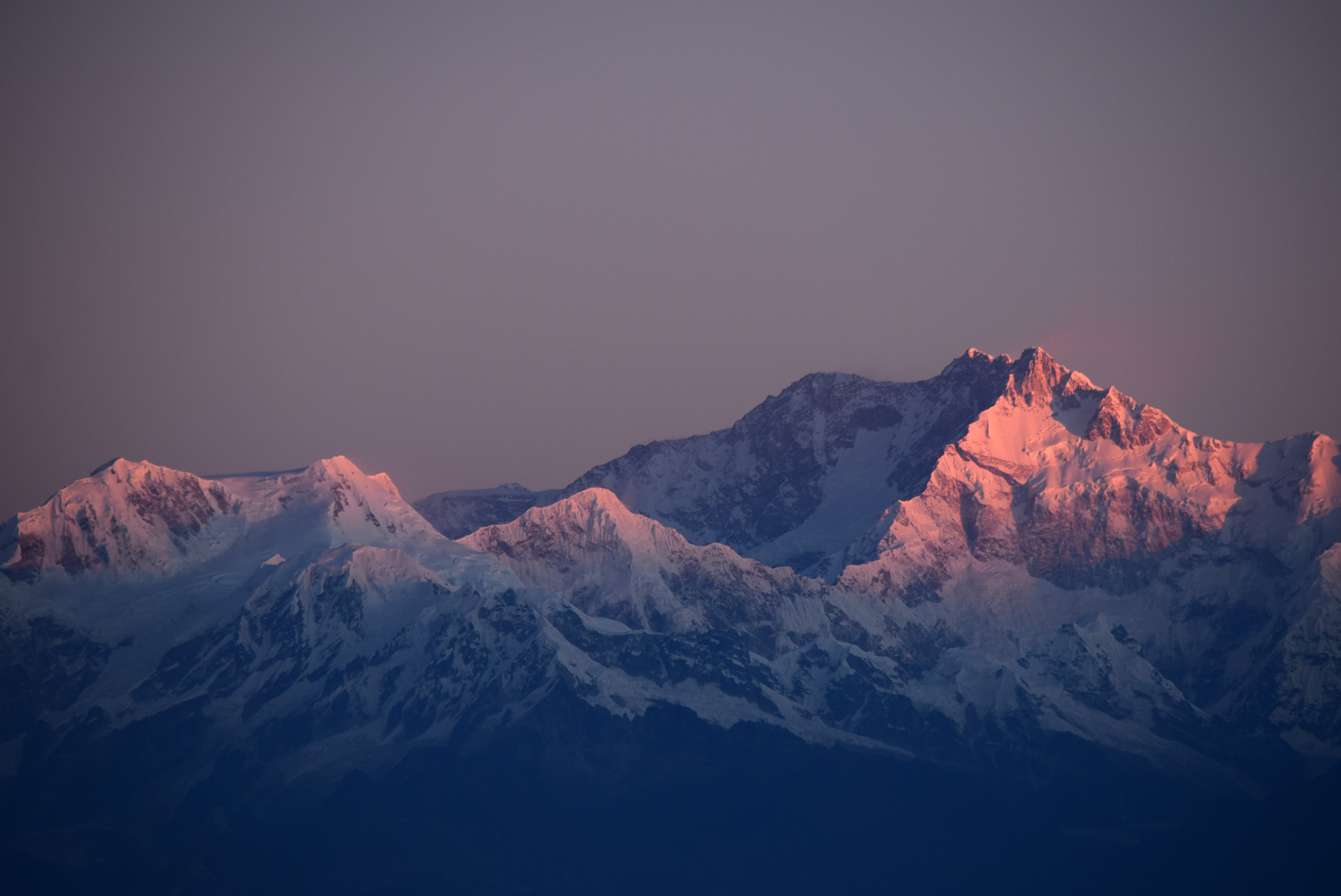 Snow
              capped mountains at sunset